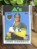 Front of Jose Canseco 2020 Topps baseball card showing player portrait and Rookie Card Medallion
