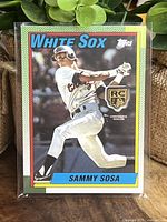 Front side of Sammy Sosa Topps 2020 Rookie Medallion baseball card, showing player batting and rookie card logo.