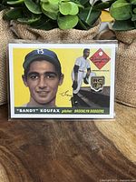 Front of Sandy Koufax Rookie Medallion card showing player image, Dodgers branding and rookie medallion logo.