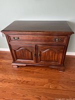 Front view of sideboard showing drawer and cabinet doors