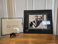 Photo of the framed signed print featuring Doug Gilmour and Tie Domi