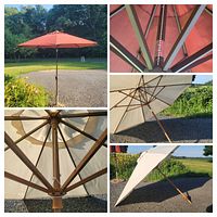White outdoor umbrella viewed from the side and underside, showing wooden frame and extension pole missing at bottom.