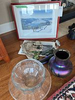 Overall view of all items including bowl, platter, vase, artwork, figurines, paperweight, textile