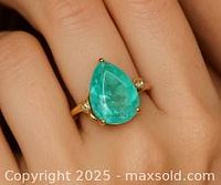 Ring worn on finger to illustrate size and fit