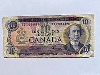 Front side of the 1971 Canadian $10 bill showing Sir John A. Macdonald portrait and serial number ETC2058898.