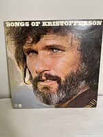 Front cover of vinyl record album showing close-up portrait of Kris Kristofferson with minor wear visible.