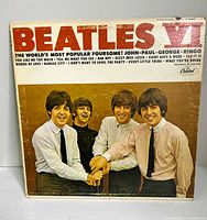 Front cover of Beatles VI vinyl album showing the Beatles group photo and album title
