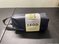 Full travel kit in navy blue bag with handle and label showing Kit contents.