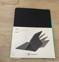 Front view of the Logitech Create case packaging for iPad Pro showing multi-angle stand illustration.