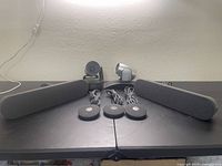 Full lot view showing 2 webcams in back, 3 microphones front center, and 2 speakers on sides