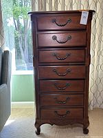 Full frontal view of seven-drawer lingerie chest with bail handles