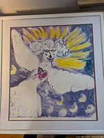 Full view of the monotype art depicting winged dog with yellow rays and crescent moons in background