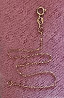 Close-up of clasp and chain detail