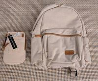 Front of cream backpack and phone pouch