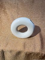 Front view white circular ceramic vase