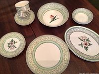 Group shot of plates, bowls, cups, saucers, platter