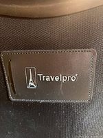 Travelpro logo patch on exterior