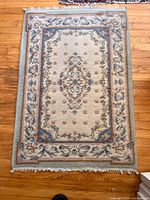 Full view of rug on hardwood floor