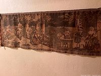 Full tapestry on wall showing complete scene and rod