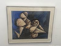 Framed modern abstract geometric painting with dark blue background and beige shapes.