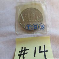 Silver Jubilee coin in plastic pouch showing TSB markings and a sticky note labeled #14