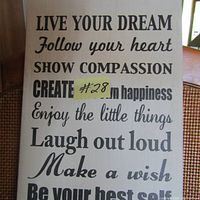 Close-up of smaller canvas showing inspirational quotes in black typography on white background, including phrases 'Live Your Dream', 'Follow your heart', 'Show Compassion'.