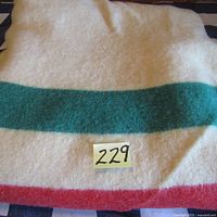 Close-up of cream wool with green stripe