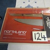 Photo of two carving knives in original Northland inoxydable stainless packaging with sticker '124'