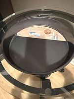 Crofton 12-inch pizza pan with original label inside