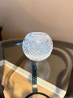 Front angled view of spherical Waterford crystal vase showing diamond cuts