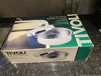 Photo of the original Tivoli Double Oval Roaster box, showing branding and product name.