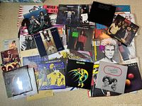 Overview of album lot showing assorted vinyl record sleeves