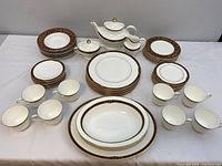 Full set of Royal Doulton Tennyson dishes arranged showing varied dish types and serving pieces