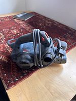 Electric hand planer with power cord wrapped around