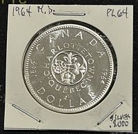 Reverse of the coin showing floral emblems and Charlottetown, Quebec City text.