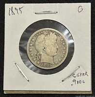Obverse of 1895 US Silver Barber Quarter Dollar coin in cardboard holder, shows Lady Liberty's head profile with dated 1895, noted G condition and 90% silver.