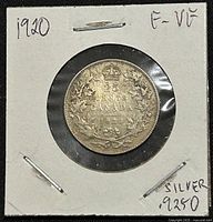 Front side of the 1920 Canadian 25 cents silver coin displaying the denomination, country, year, and wreath design.