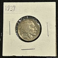 Front (obverse) of 1937 Buffalo Nickel showing Native American profile and date.