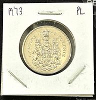 Reverse side showing 1973 Canadian Coat of Arms on the 50 cent coin