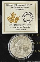 Label showing coin description, silver content 99.99%, Royal Canadian Mint logo, and bilingual text.