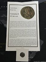 Ancient Roman bronze coin with descriptive text about Constantius II and historical context.