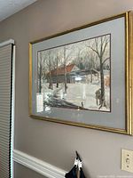 Full view of framed watercolor painting hanging on wall