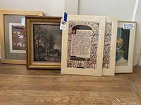 Group of 5 art prints showing two decorative calligraphy prints, a landscape with two figures, a still life of fruit, and two abstract prints.