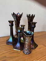 All 7 vintage carnival glass pieces together showing iridescent finish and shapes