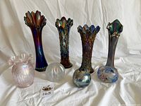 Front view of all eight glass pieces arranged on white background