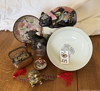 Group shot of all lot items on a wooden surface