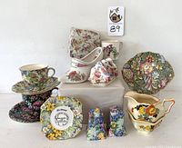 Full set arranged displaying various Royal Winton pieces with floral patterns in multiple colors.