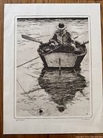 Close-up image of the "Just Fishin’" print showing a man fishing alone in a rowboat, with detailed shadow and reflection in the water.