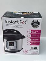 Front view of the Instant Pot IP-DUO60 V3 box showing the product image, key features, and brand information.