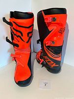 Front angled view of both boots showing overall design and condition